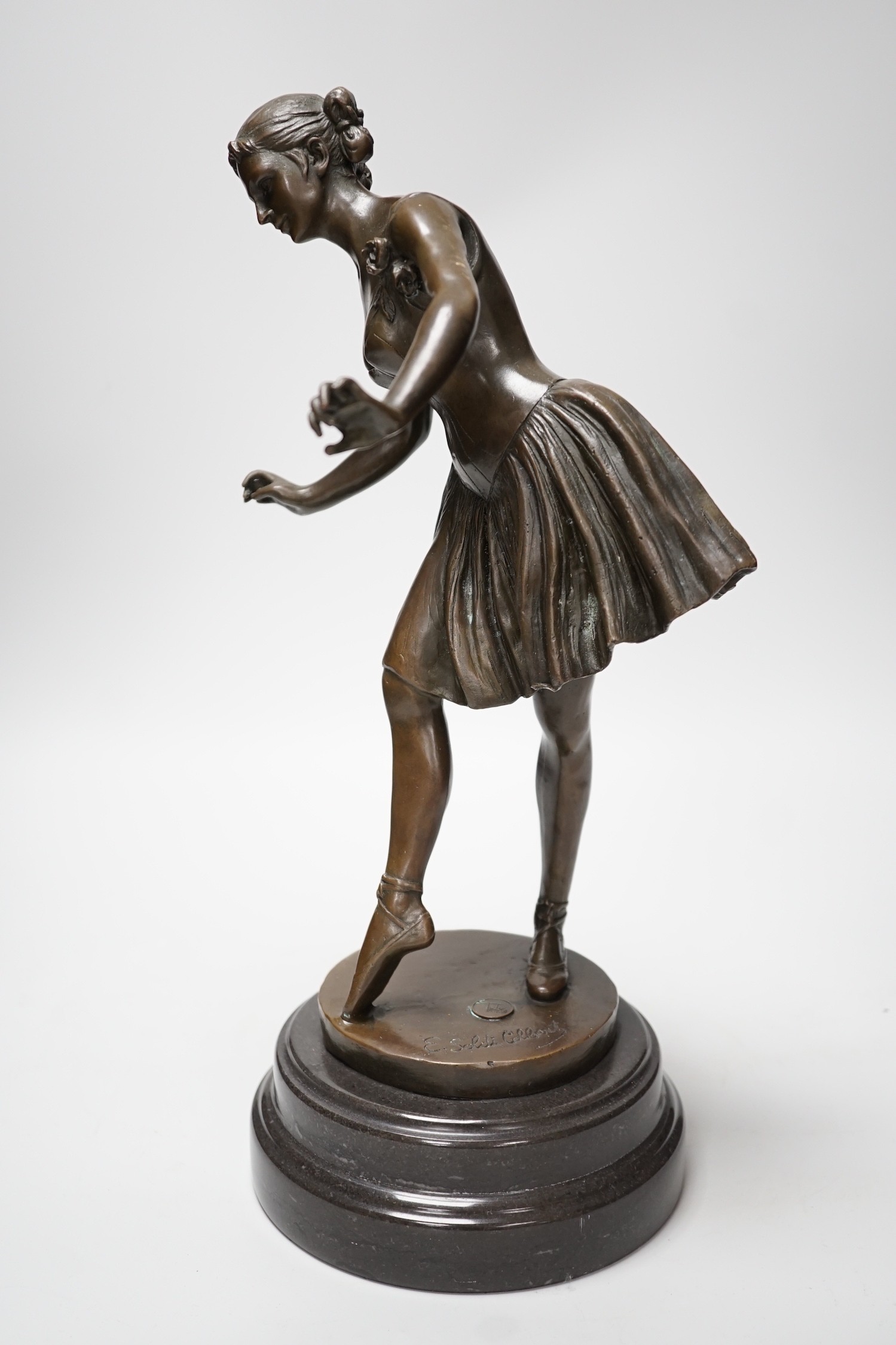 A bronze figure of a ballerina, signed, 40cm tall